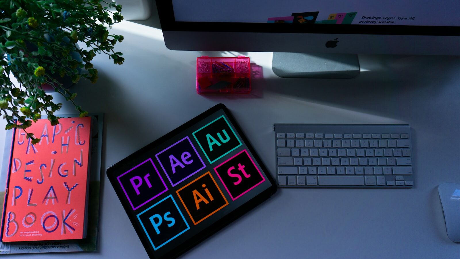 silver imac and apple keyboard